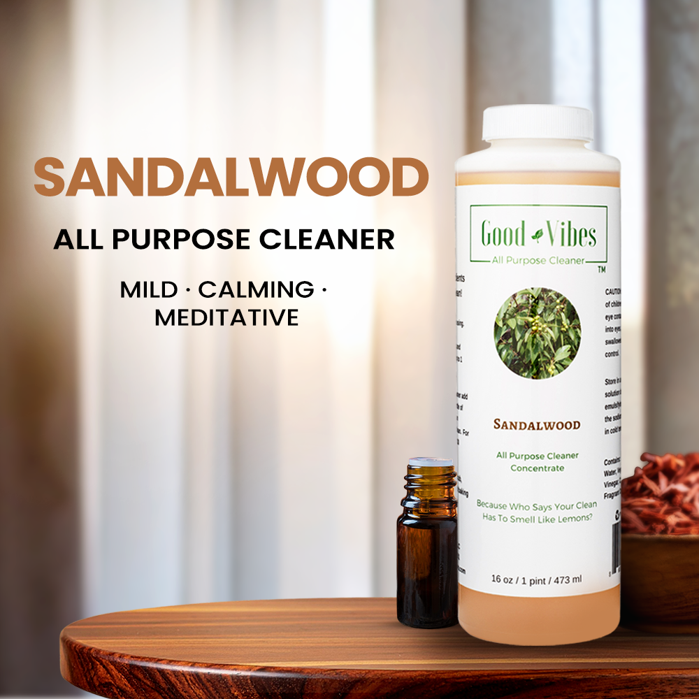 Sandalwood all-purpose cleaner bottle with essential oil bottle on a wooden surface